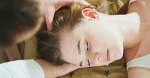 This woman is undergoing craniosacral therapy program