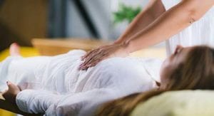 A woman receives a massage at a holistic addiction treatment center