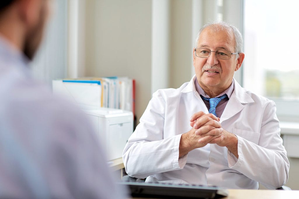a doctor offers a patient a substance abuse evaluation